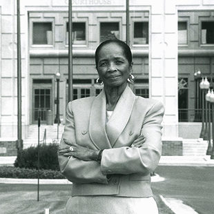 Edna Mosley in front of government building