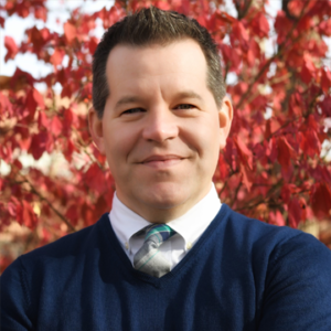 Headshot photo of Dr. Corey Sell.