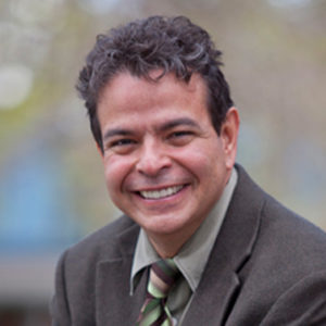 Headshot photo of Dr. Peter Vigil