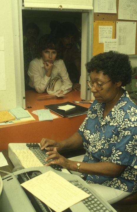 Woman at Information Help desk