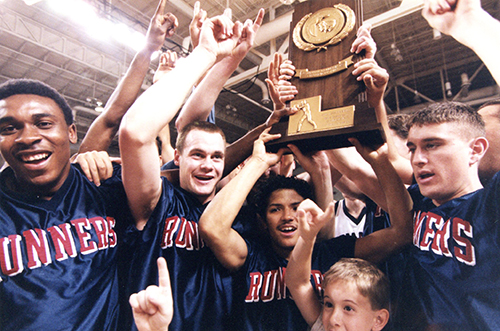 Men's Basketball team celebrating championship 2000