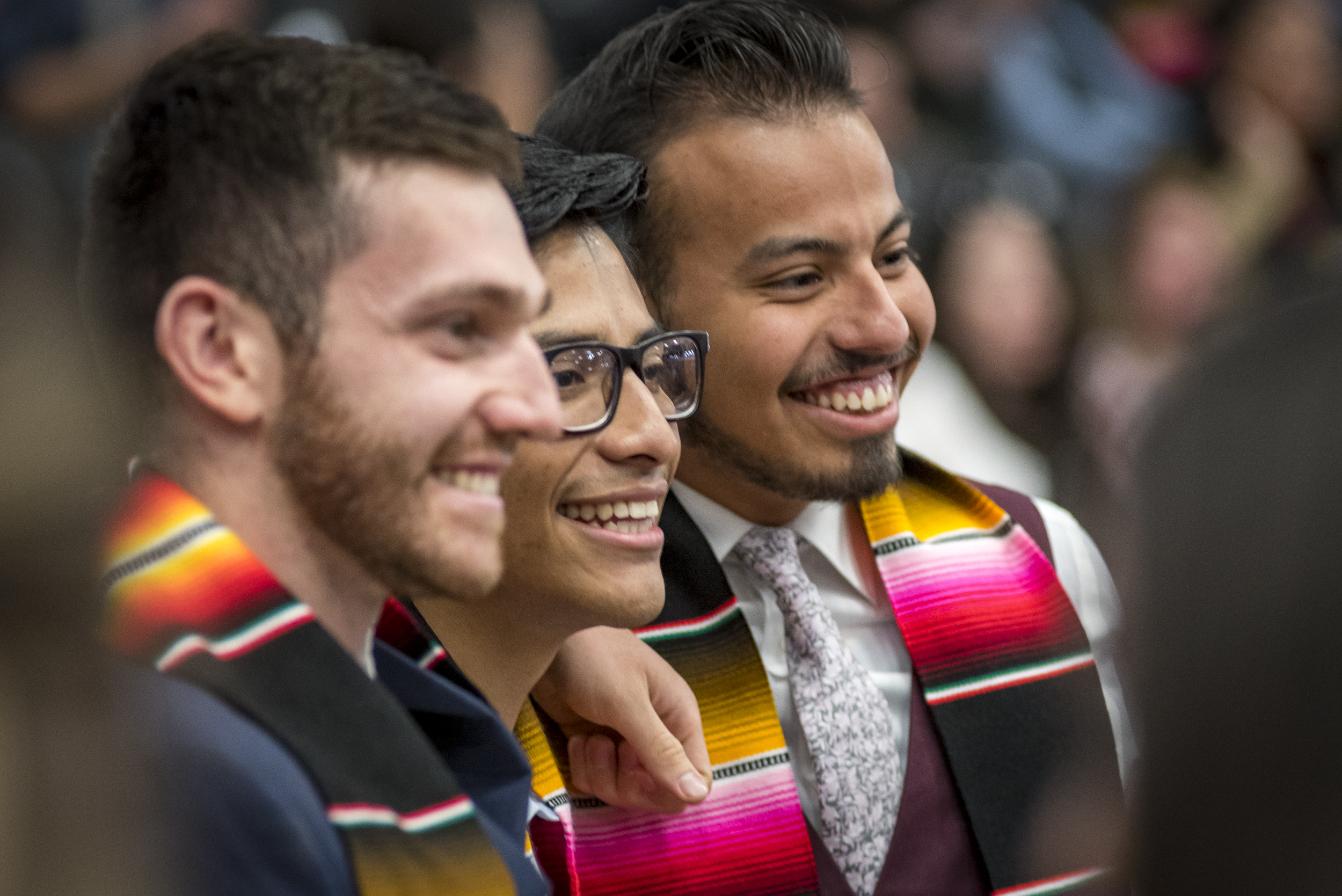 Three graduates smiling at the MSU Denver Latinx Graduation Spring 2019