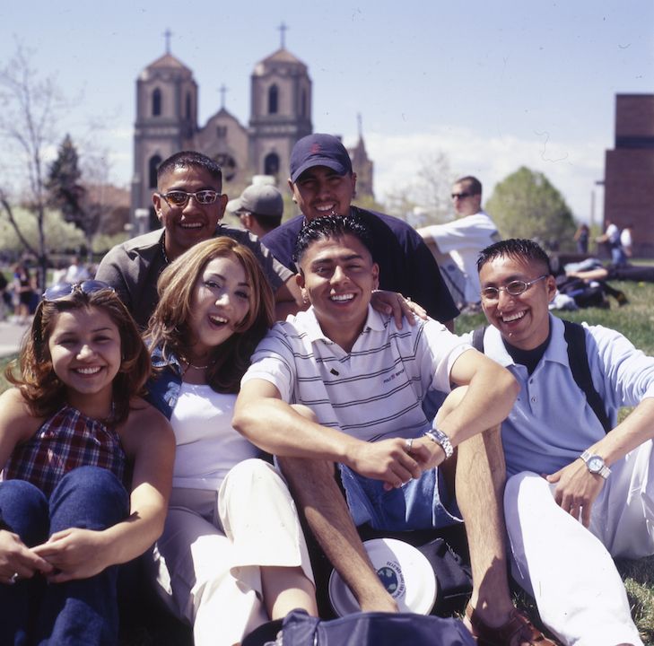 Students smiling in the sun on Auraria Campus