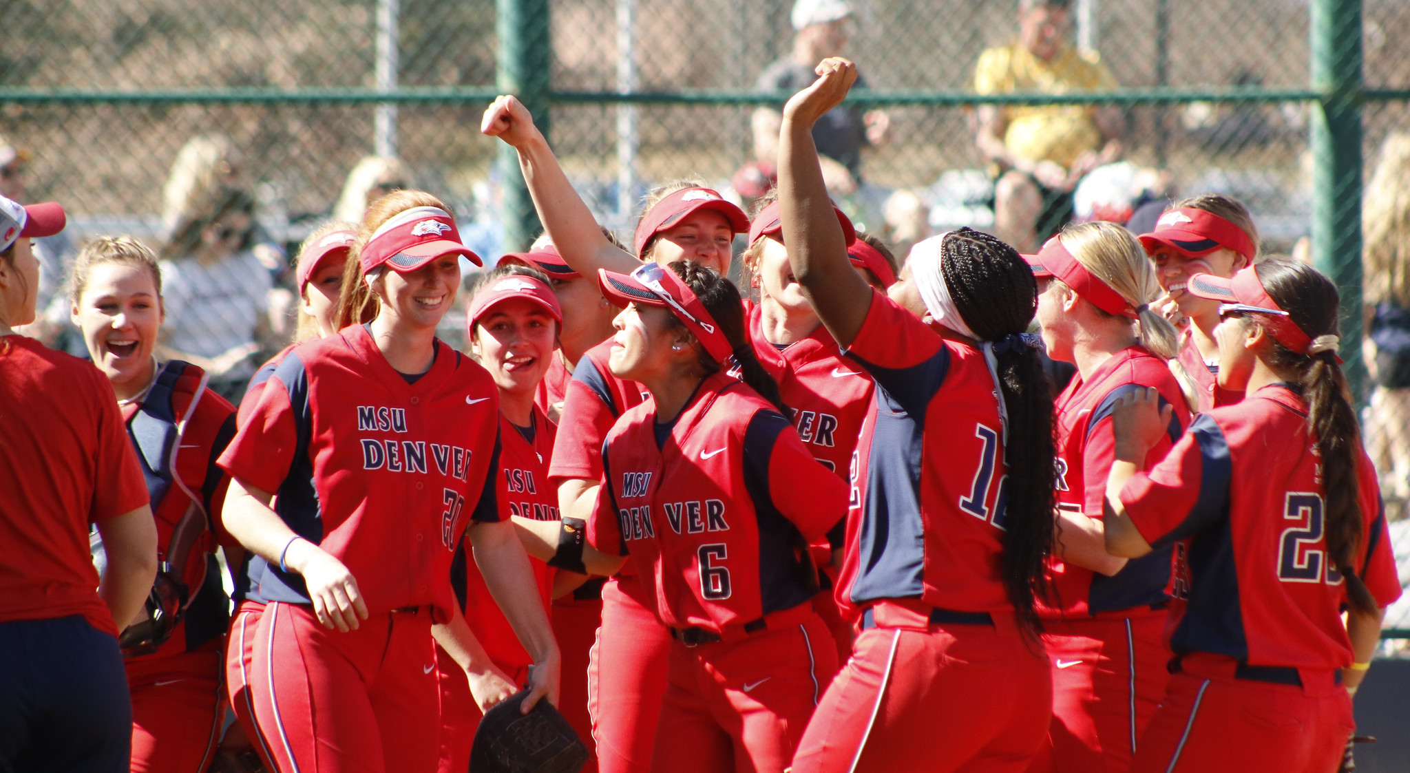 Softball team cheering