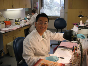 Student working on a immunohematology (blood bank) procedure in student lab.
