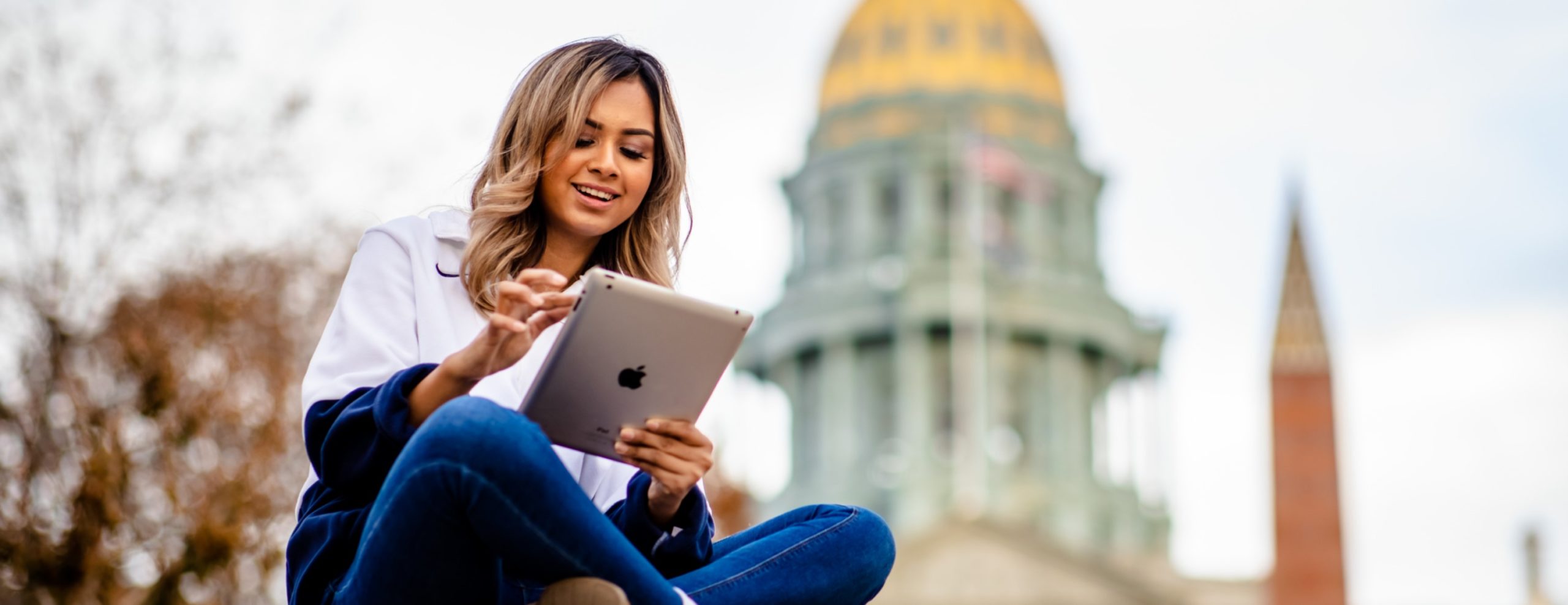 Online MSU Denver student learning outside the classroom