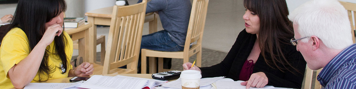 Students working at a table together