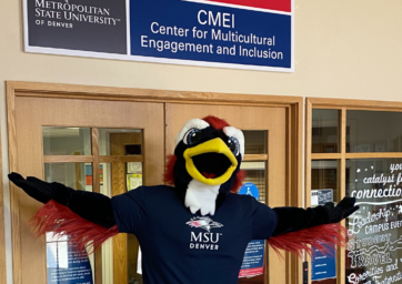 Rowdy the Roadrunner standing at the entrance of CMEI