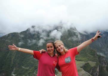 Urban Leadership Scholars smiling and posing in front of a mountain