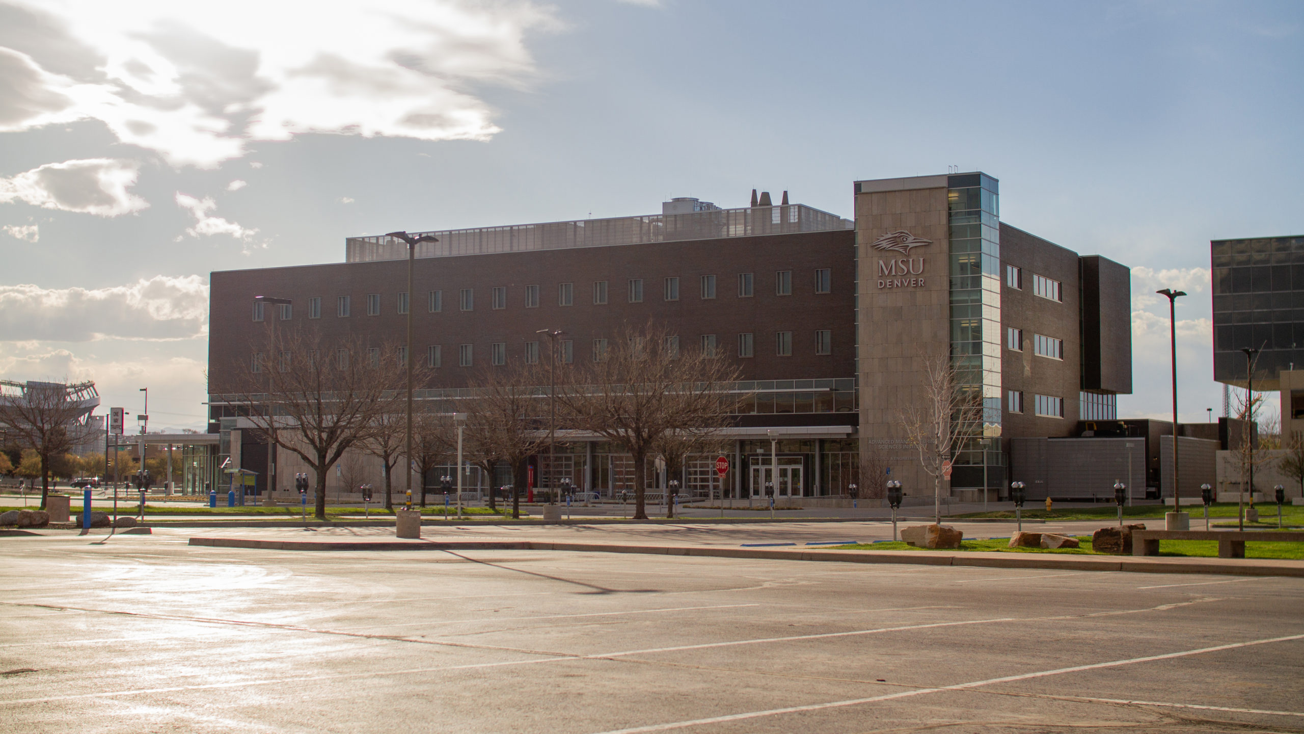 photo of campus with sun