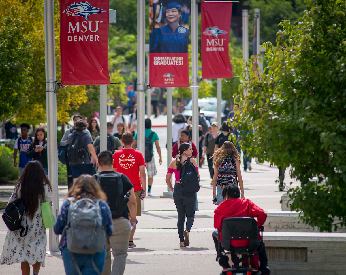 Students walking down pathway on Auraria Campus