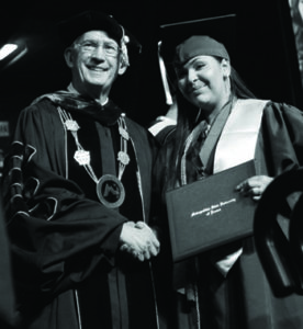 President Jordan Congratulates an MSU Denver Student Graduation