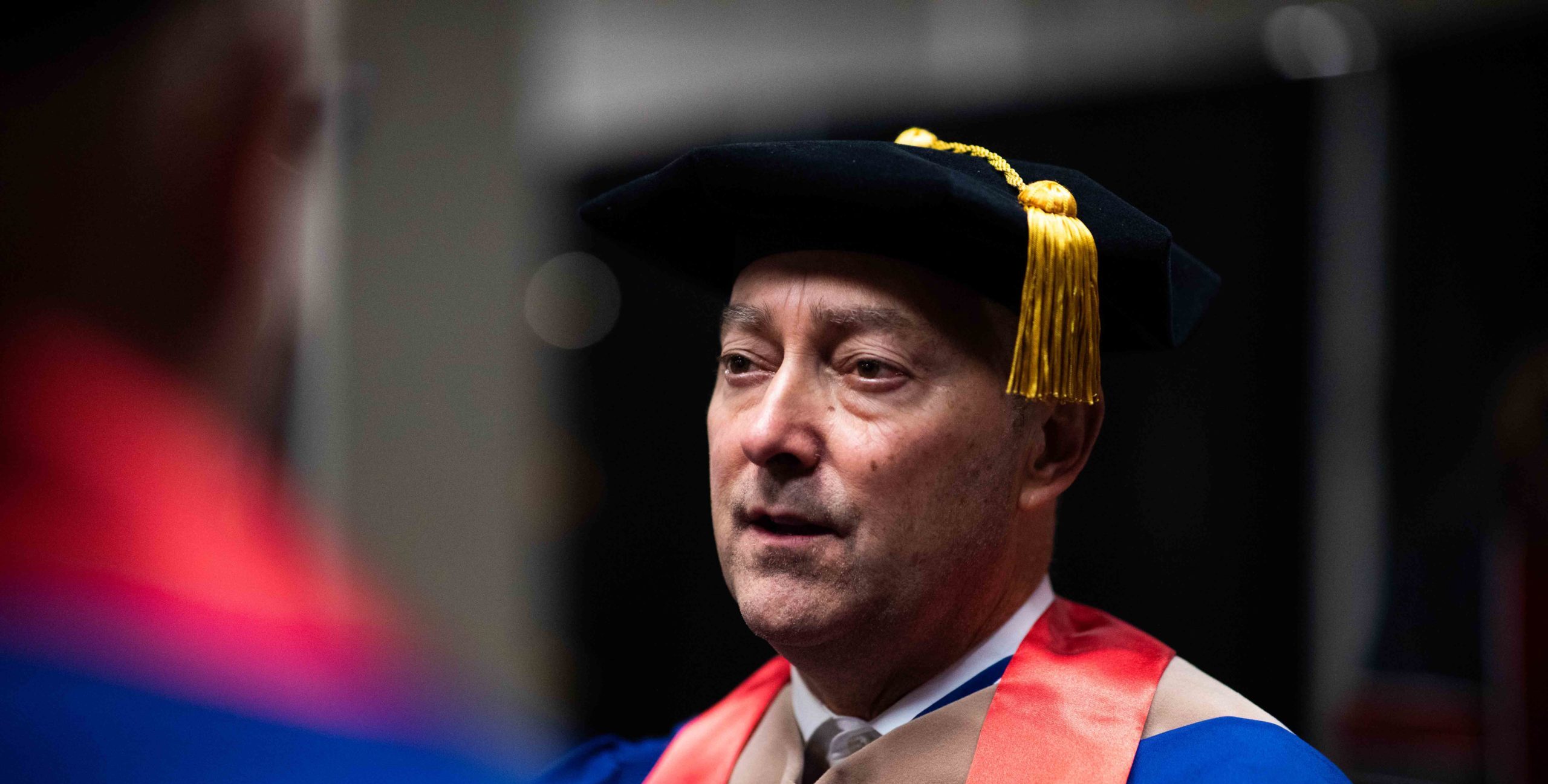 Admiral Stavridis speaking with a group of graduates.