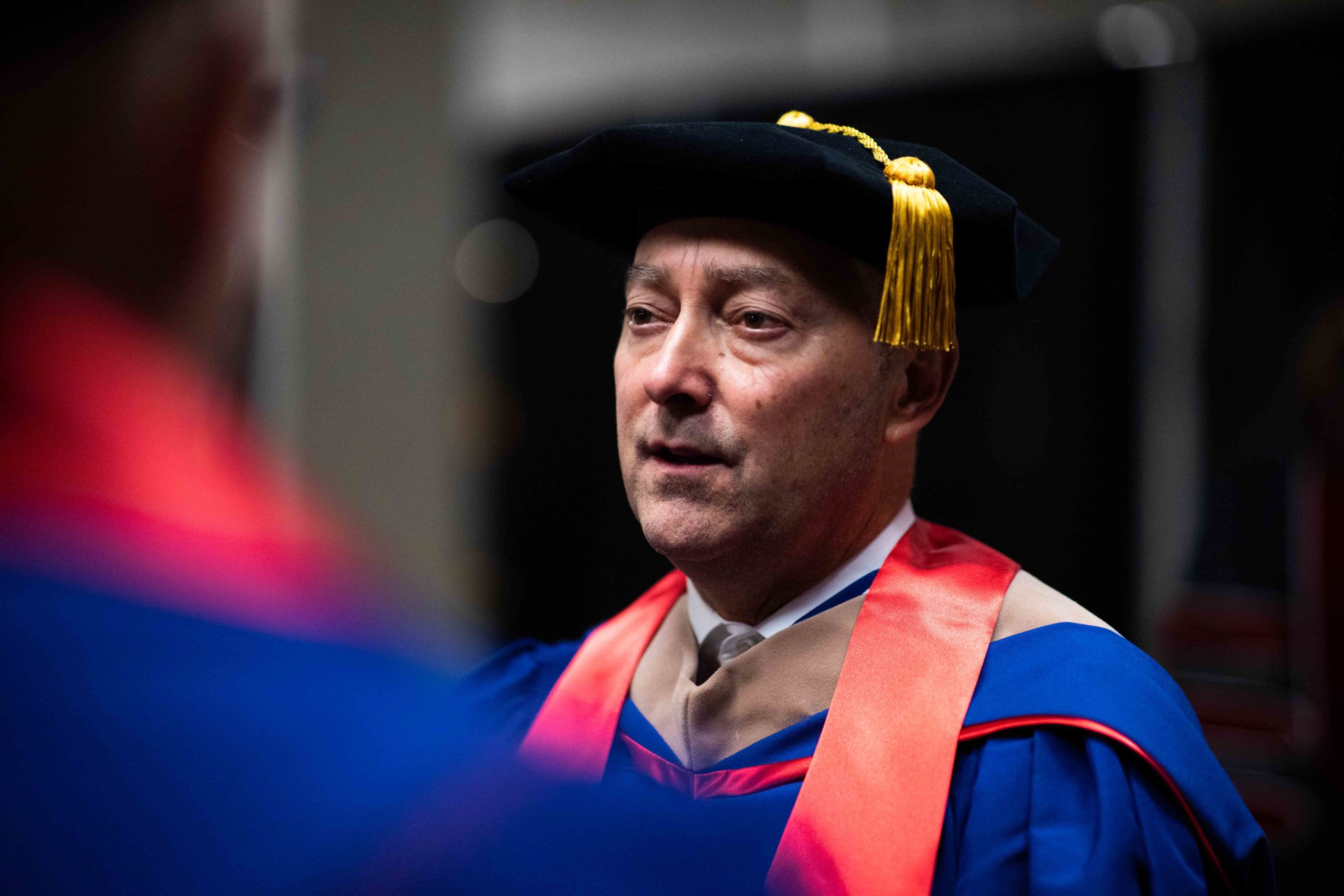 Admiral Stavridis speaking with a group of graduates.