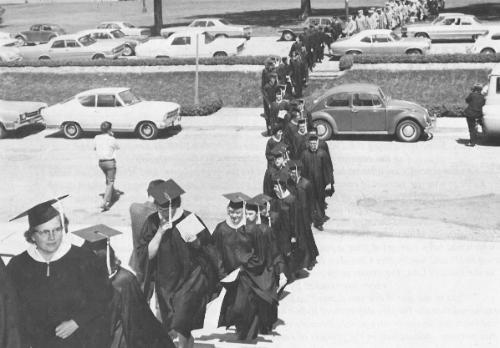 Line of graduating students first graduation