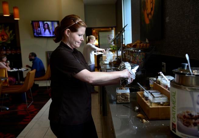 Woman working in a hotel kitchen