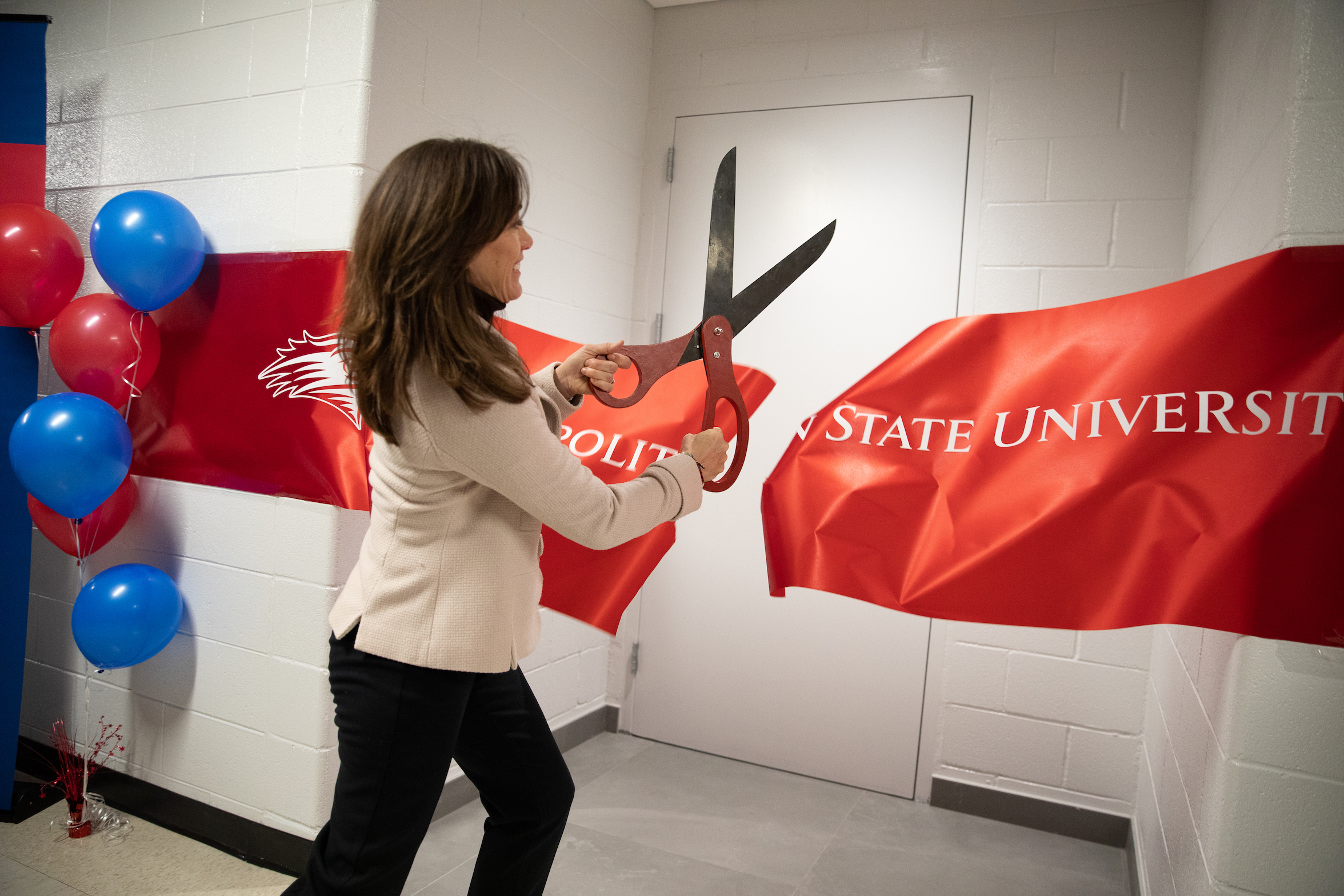 Dr. Davidson cutting the ribbon