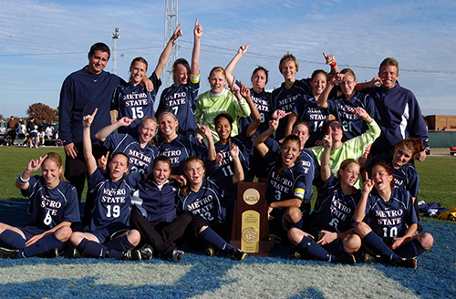 Women's Soccer team celebrating their championship 2004