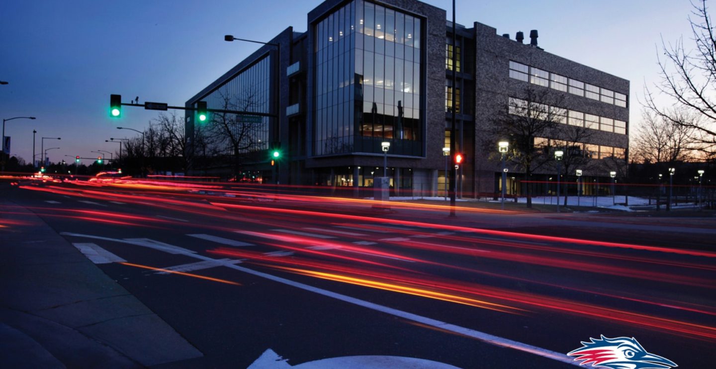 AES building at night with street lights