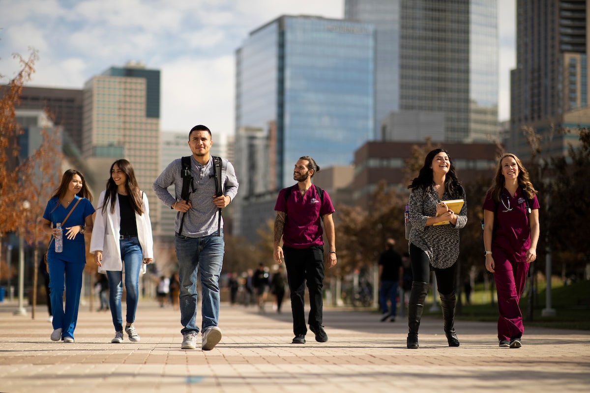 Health Administration and medical students walking through Auraria Campus in between classes.