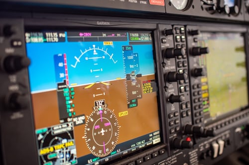 A flight deck with Garmin 1000 avionics.