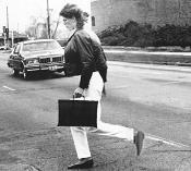 Student dodging traffic on the Auraria Campus