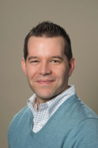 Headshot of Dr. Corey Sell.
