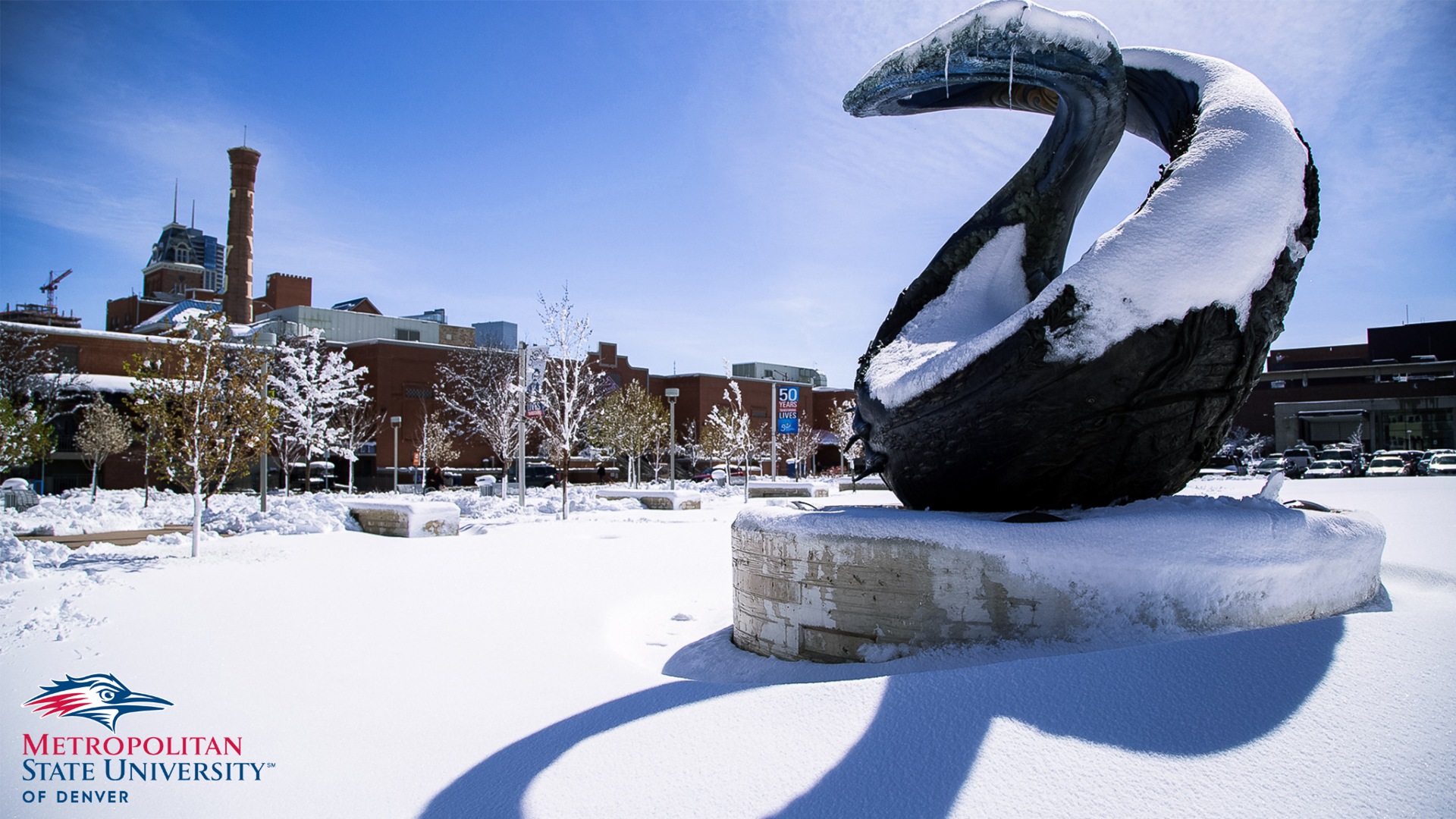 One World One Water sculpture covered in snow