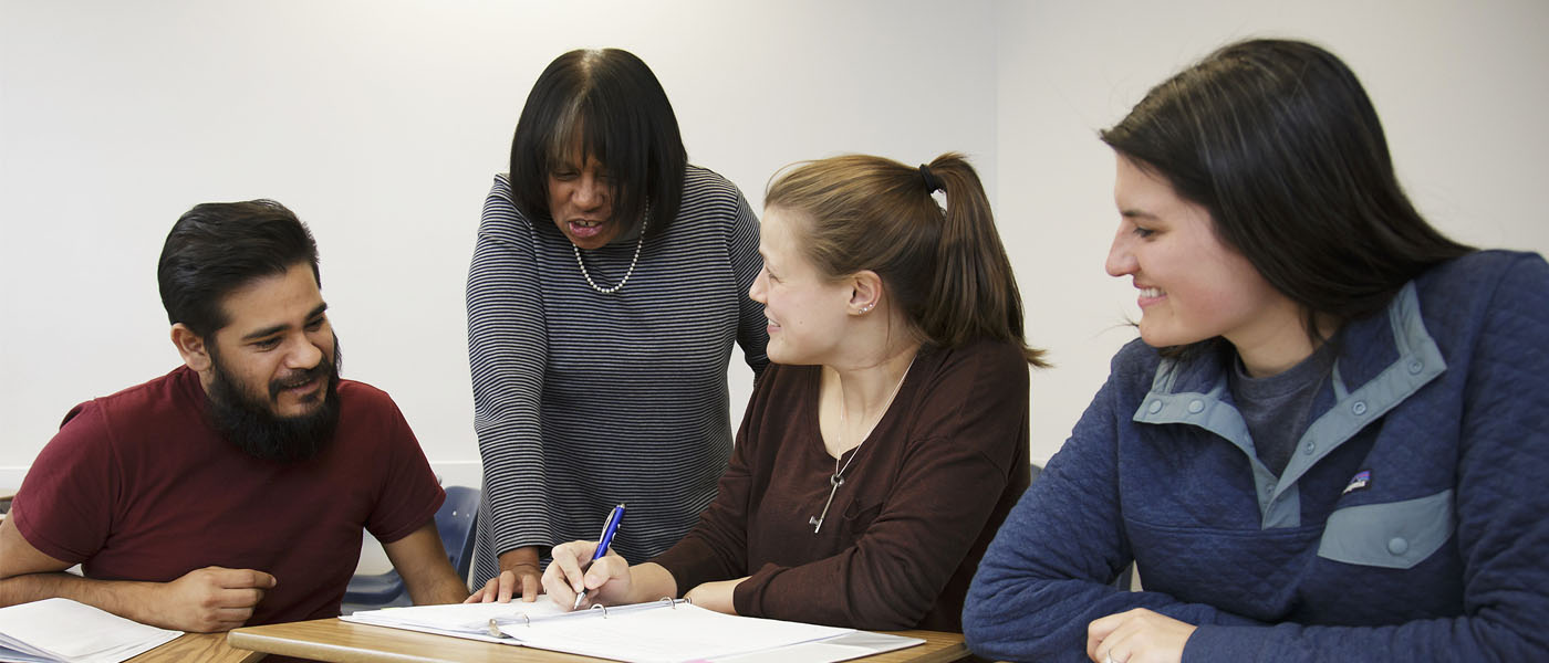Students in a classroom with a social work faculty member