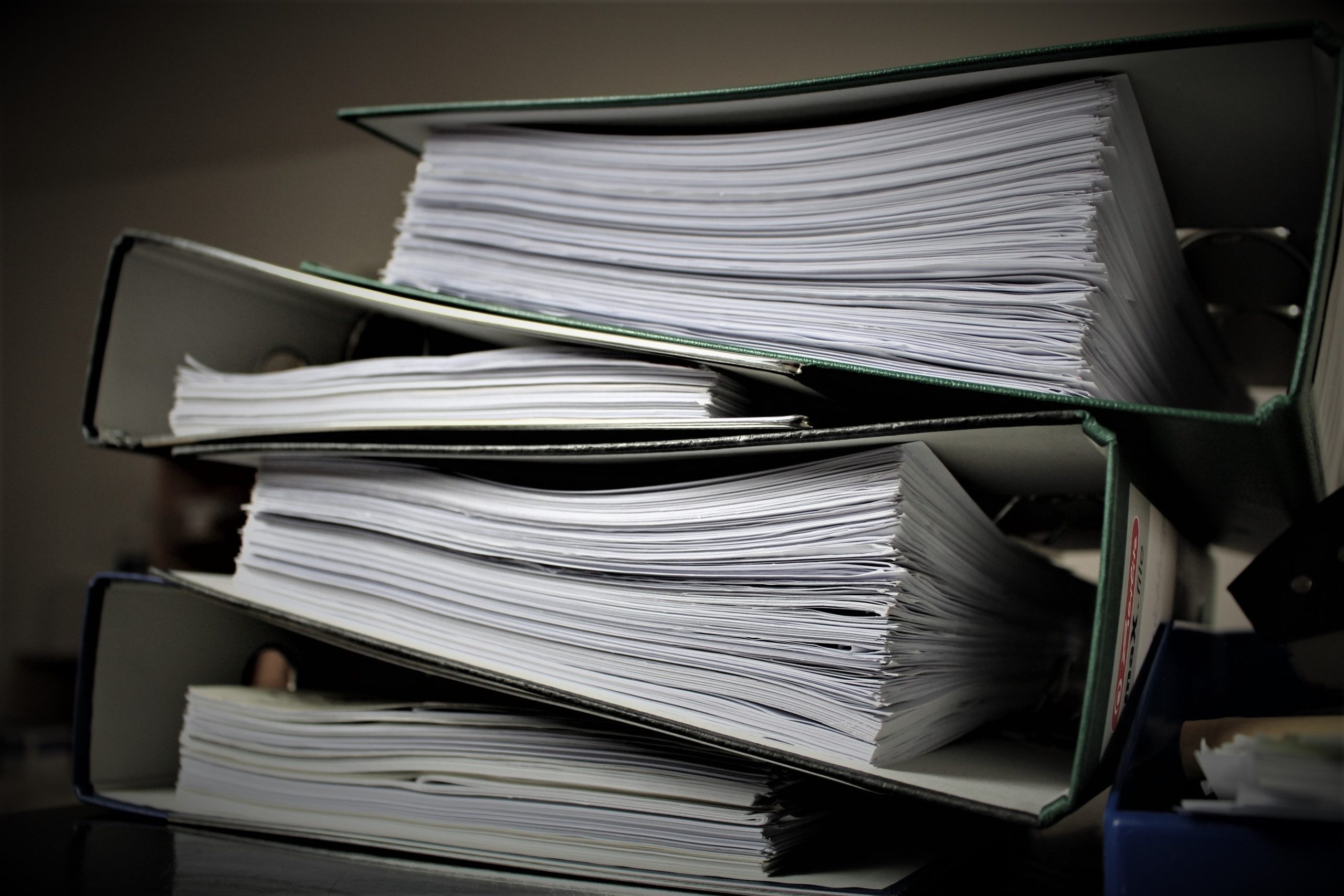 A binder containing several organized files