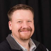 Headshot of Dr. Aaron J. Adams