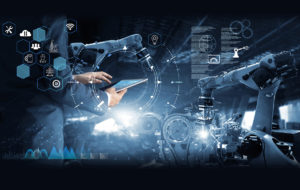 Man workng on a tablet in a lab with robotic arms and a view of digital work instructions and icons