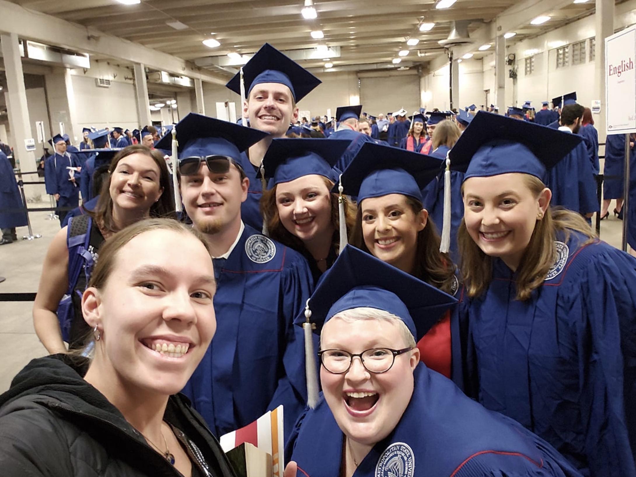 MSU Denver Graduates posing in a selfie at graduation