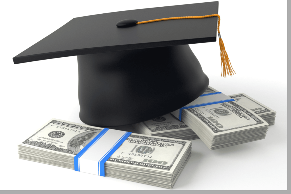 A photo of a graduation cap sitting on a pile of money.