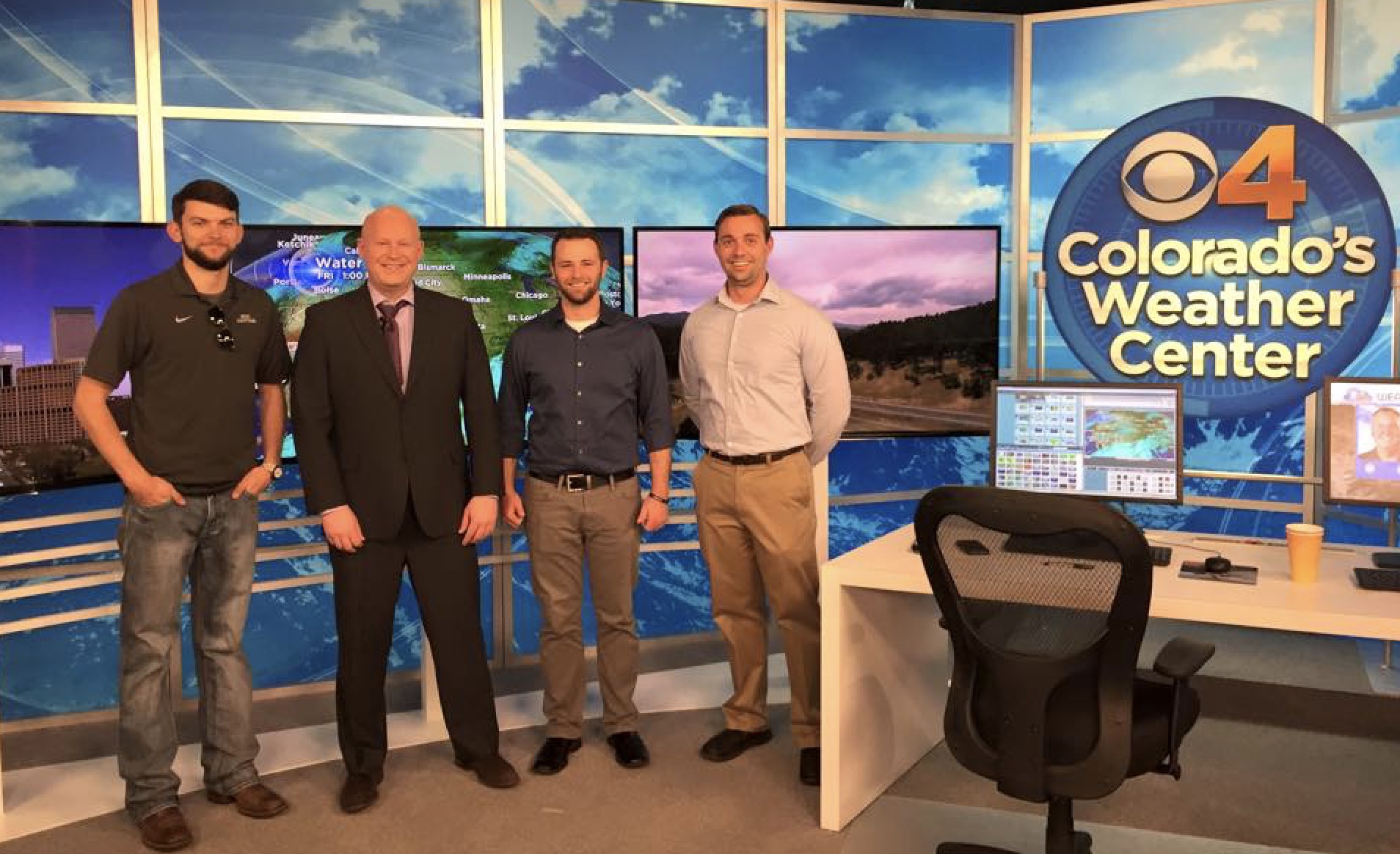 Students visit Channel 4 and pose with Chris Spears