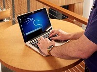 image of a person with computer