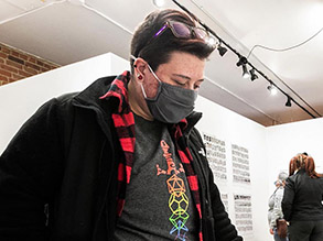 Artist with mask in studio