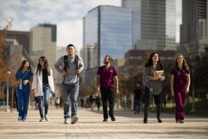 Health Profession Students walking outside on campus