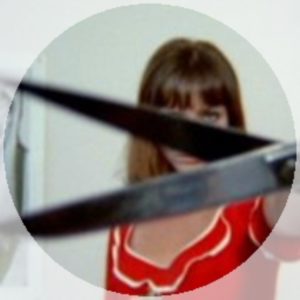 Woman holding scissors