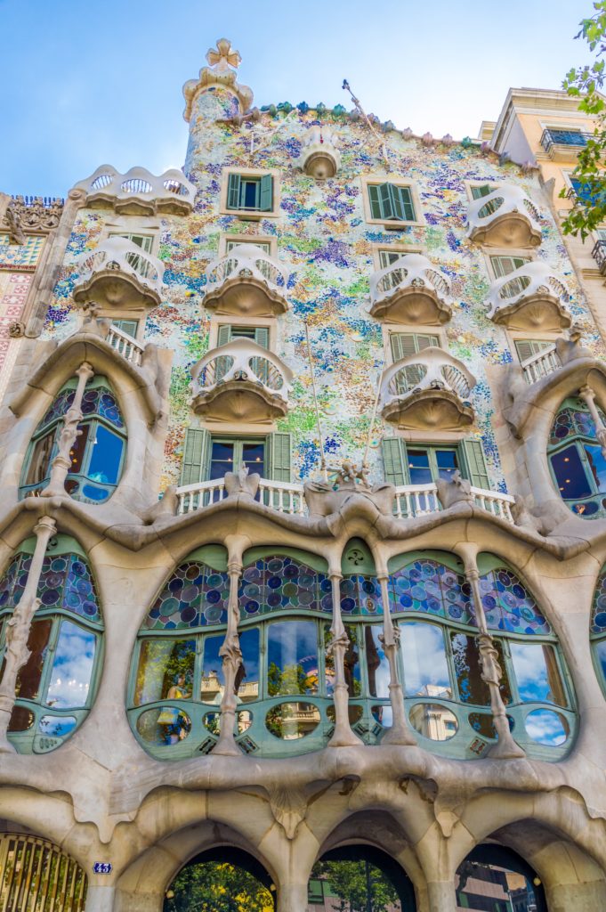 Building covered in artwork and intricate latices