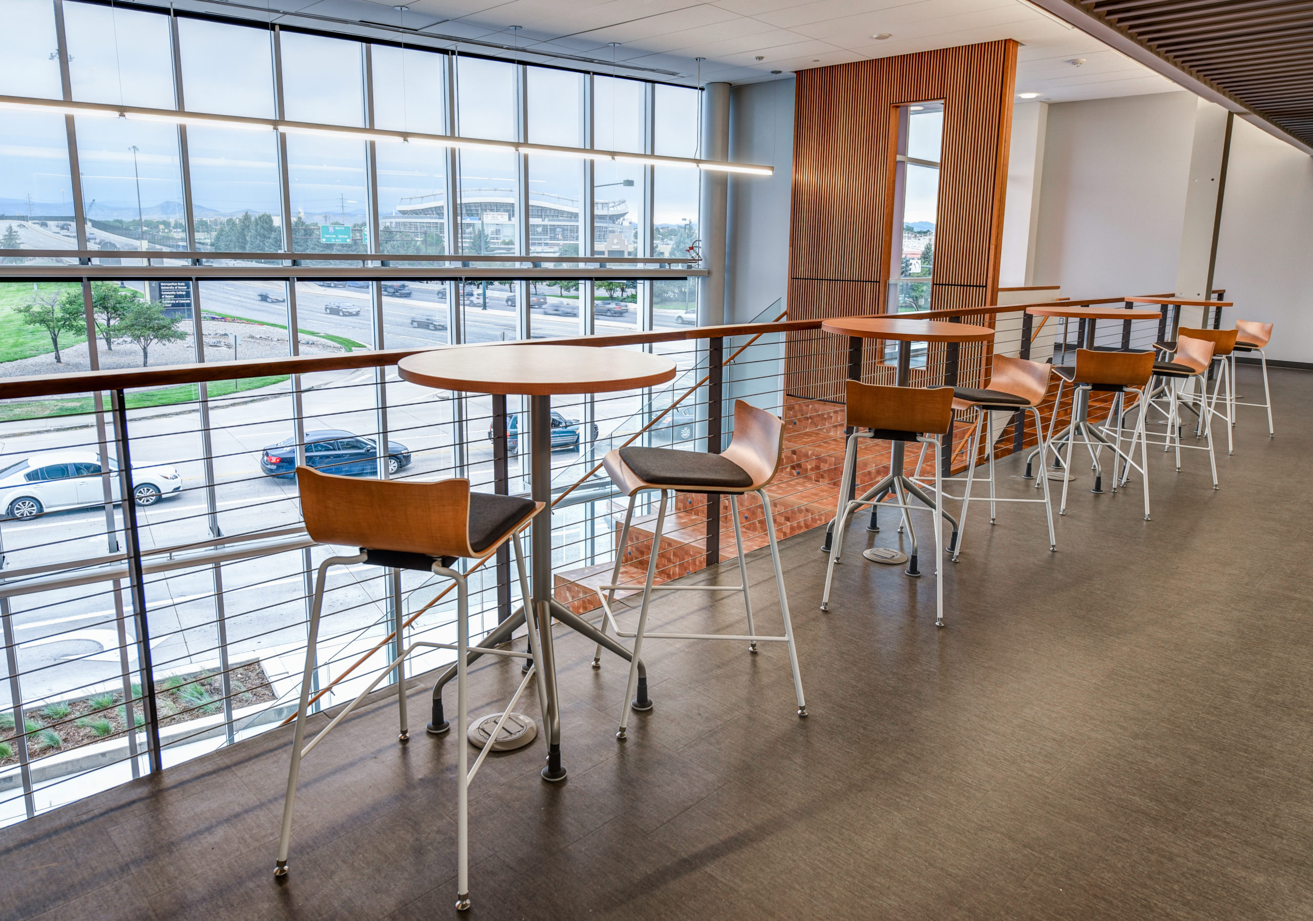 AES building hallway with hightop tables and chairs