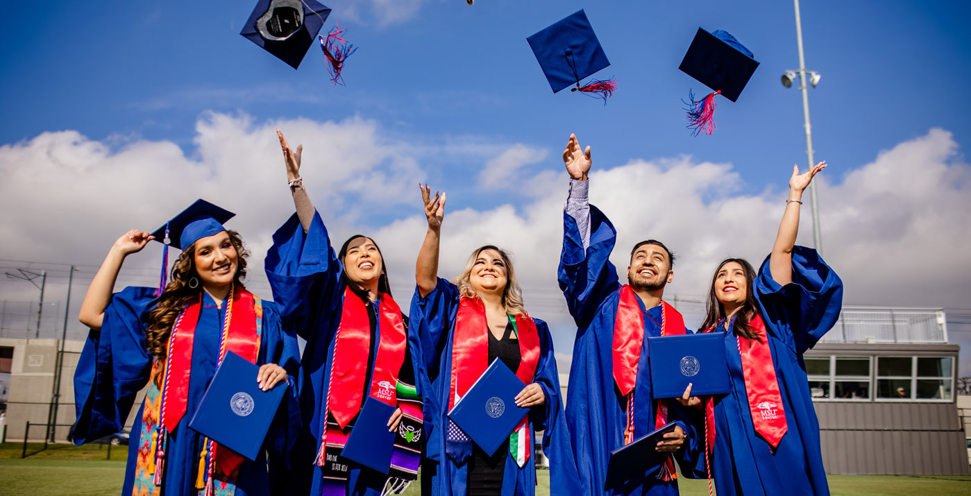 Graduation hat toss picture.