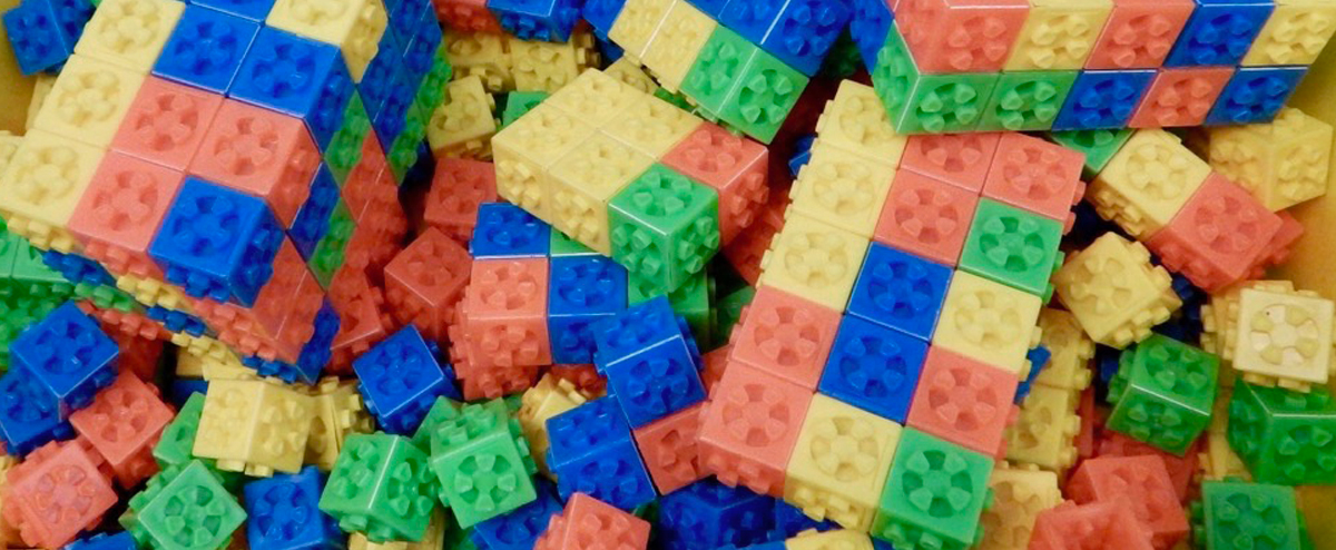 Image of a pile of colorful children's lego-style bricks.