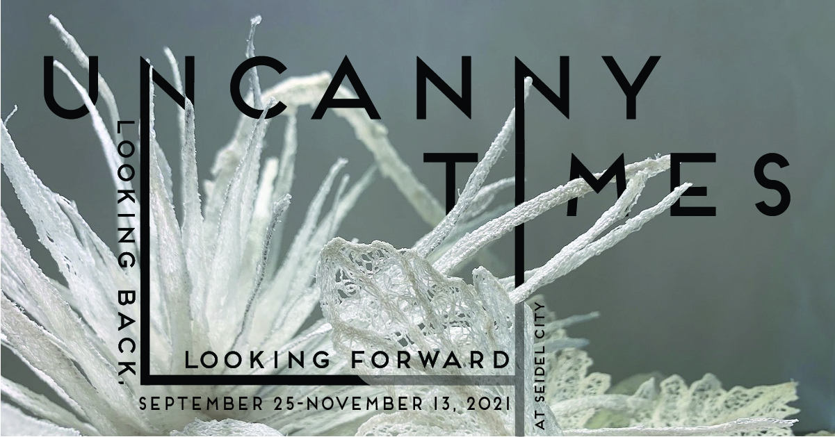 Advertisement graphic featuring white fiber art integrated into the text of the design.