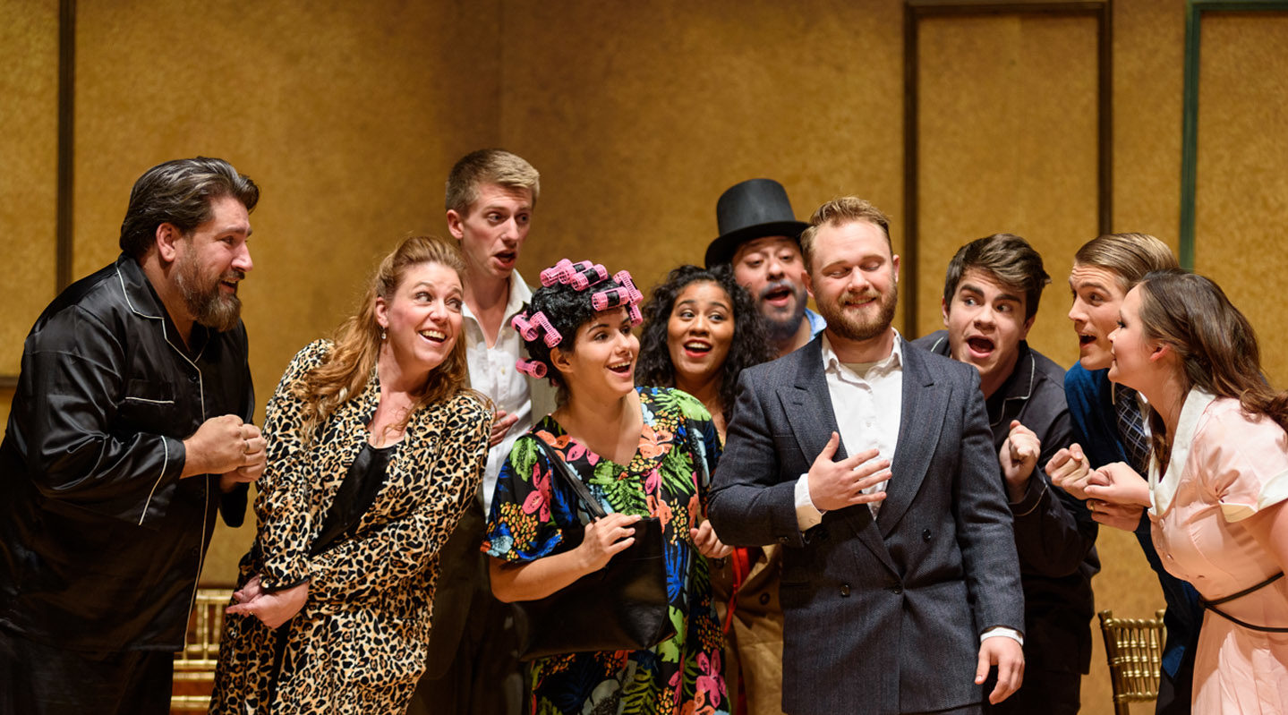 Opera cast on concert stage performing Gianni Schicchi