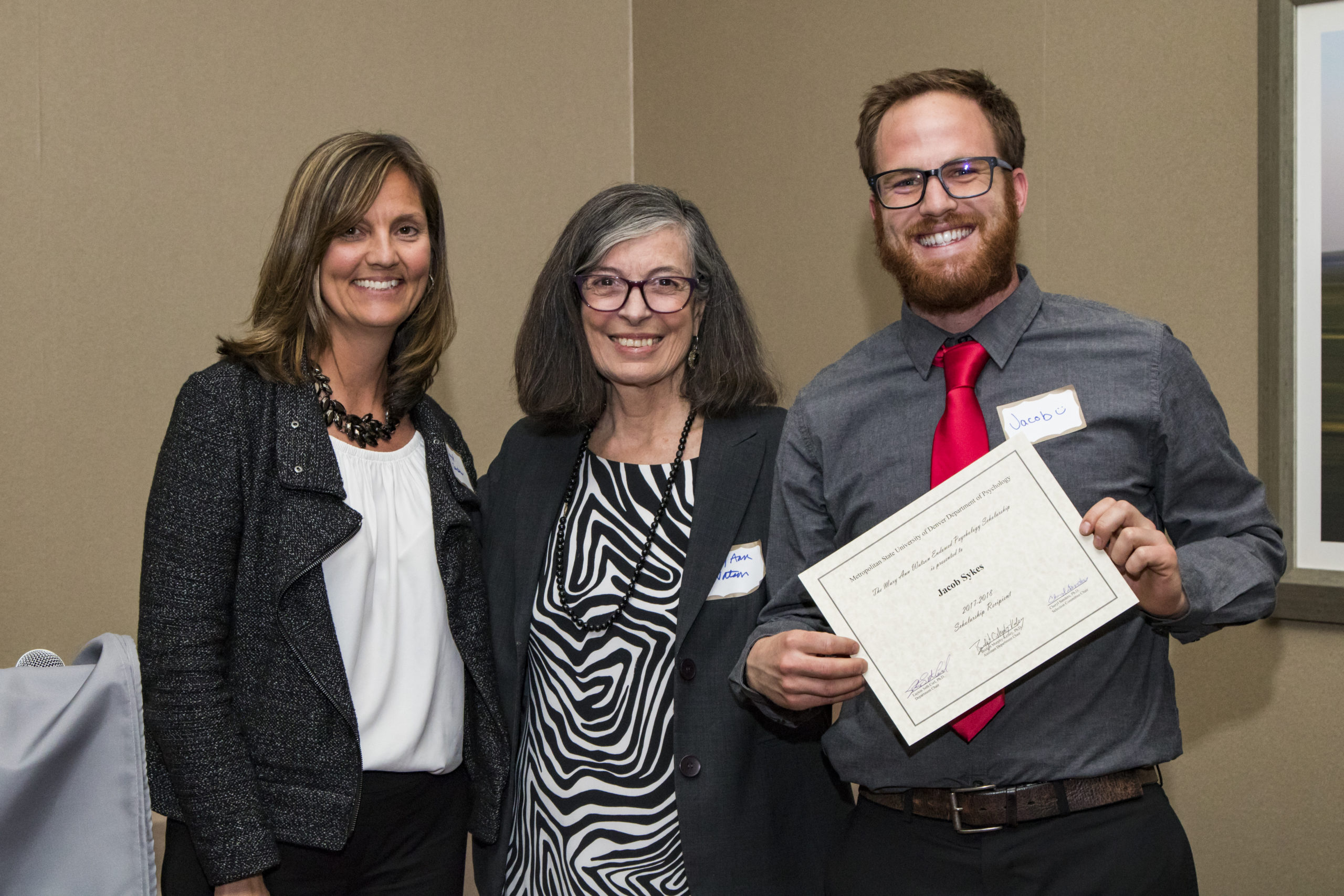 Drs. Sanders and Watson with the recipient of a scholarship.