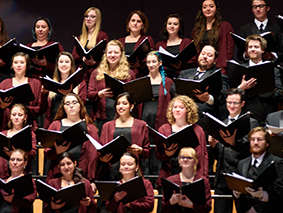 MSU Denver Chorale singing with songbooks