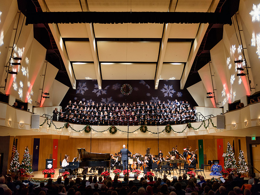 King Center Concert Hall stage filled with choir and symphony performers