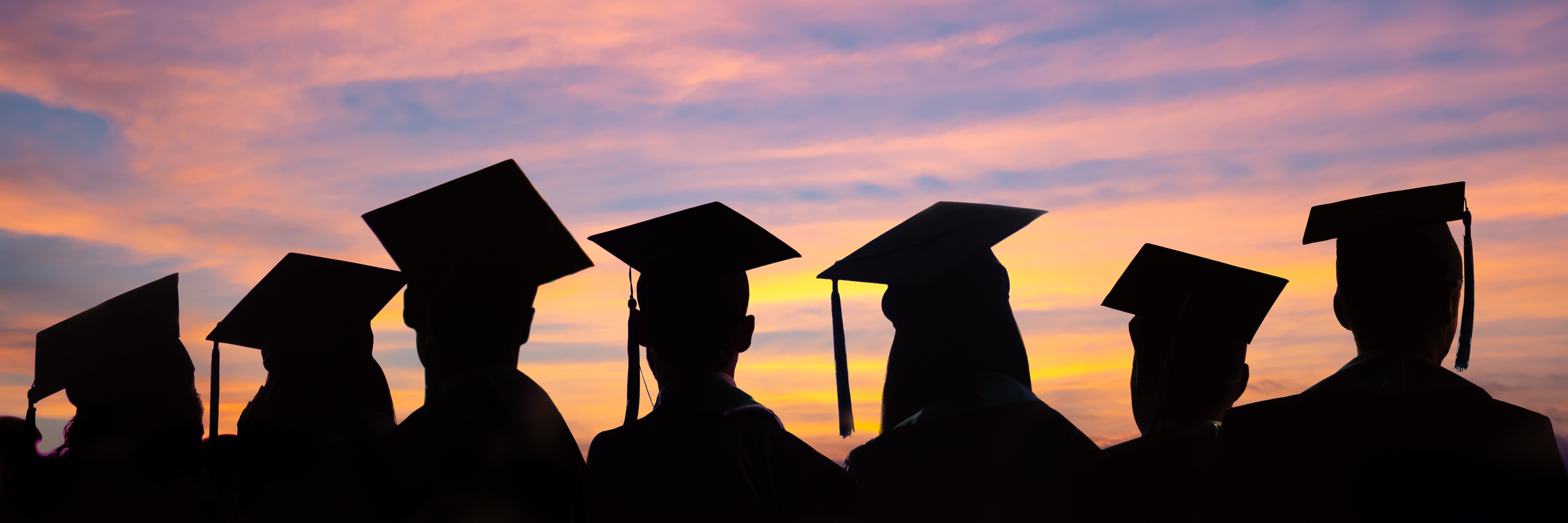 Grads in sunset