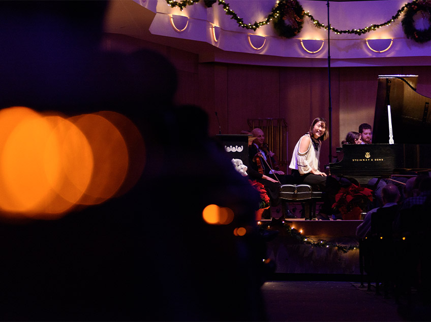 Pianist Jooeun Pak smiling at the King Center audience